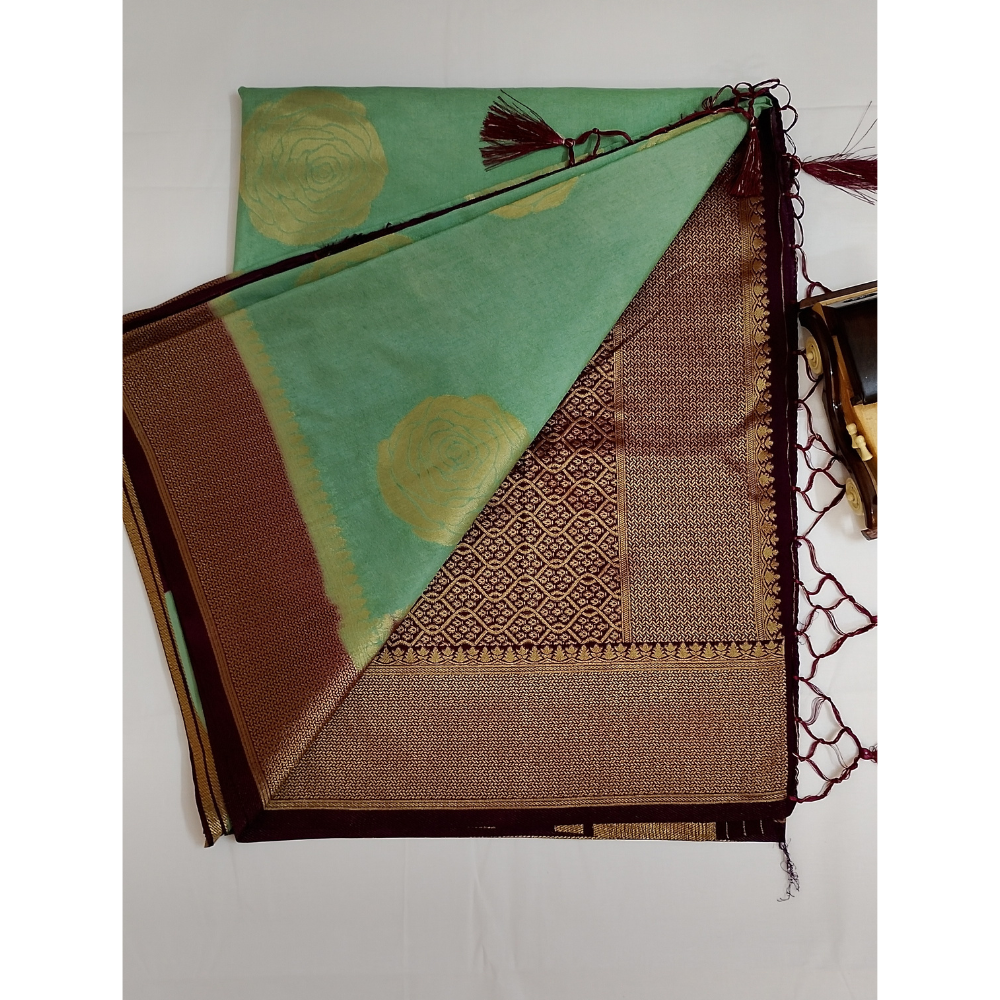 Pista geeen with Magentha border pearl viscose saree with floral motifs