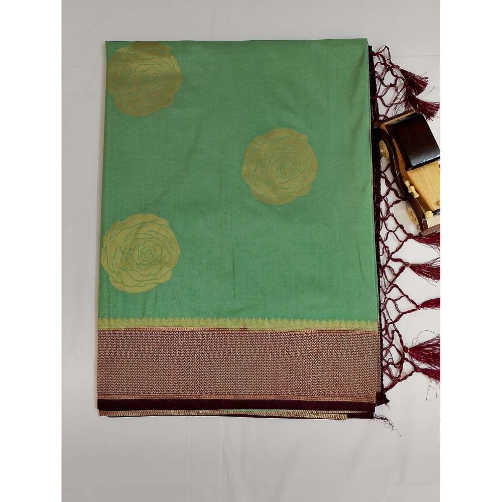 Pista geeen with Magentha border pearl viscose saree with floral motifs